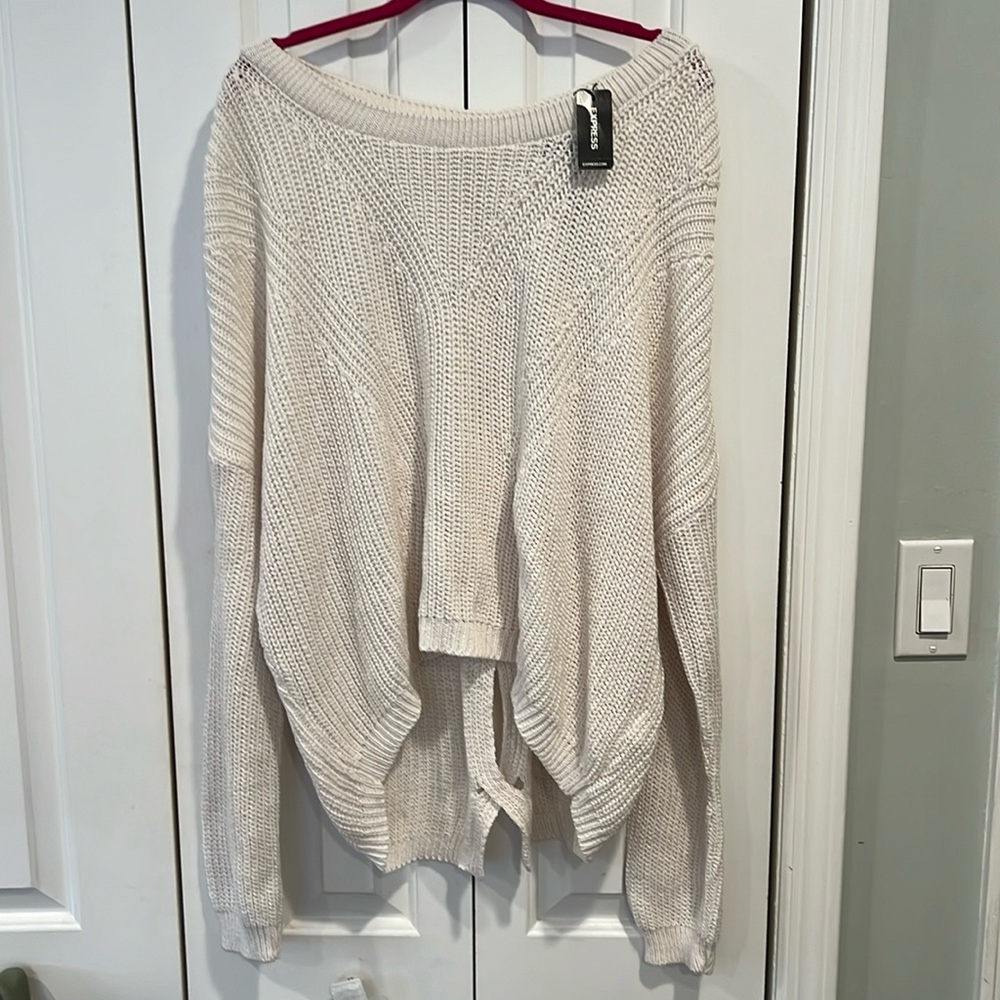 Express knit off-white sweater. Hi-lo with cut out design on back. Sz L NWT